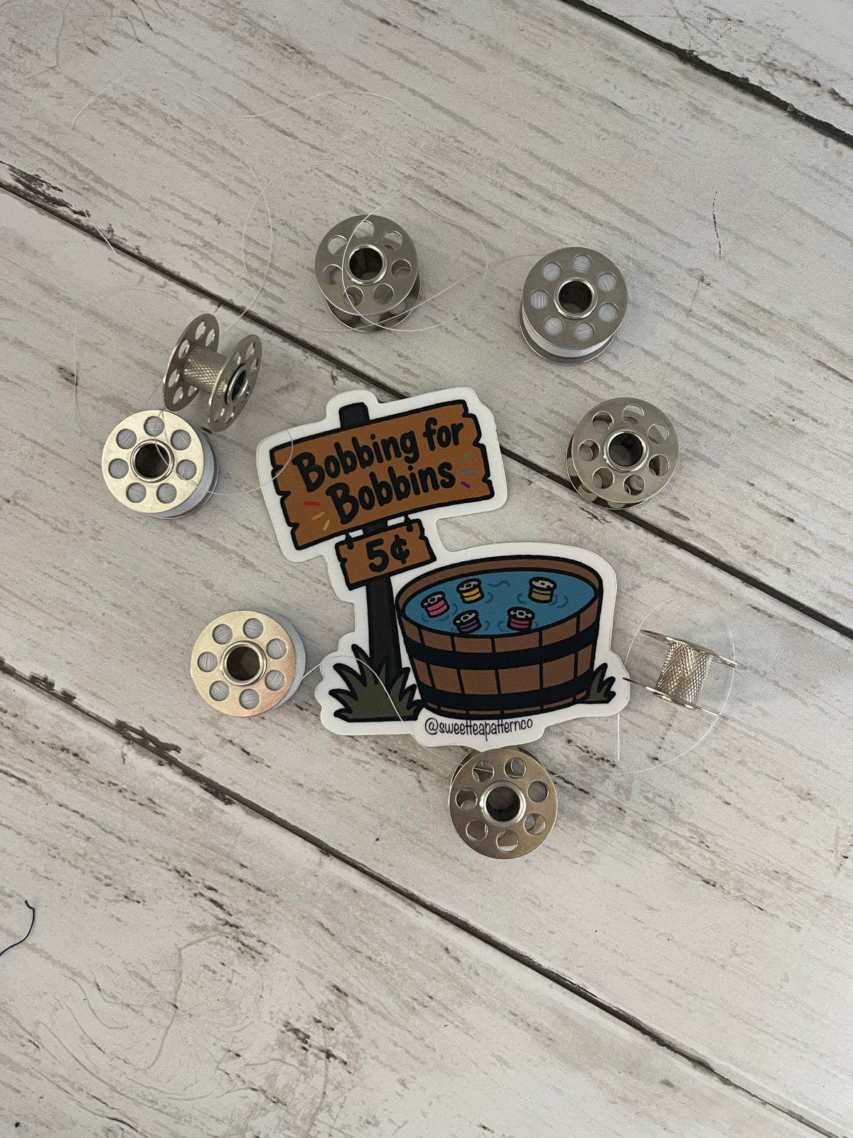 Bobbing for Bobbins Sticker